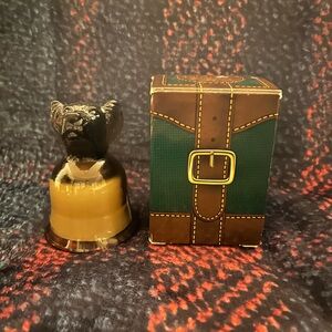 Vintage Avon Chesapeake Collection Jigger Candle with a dog's head base.